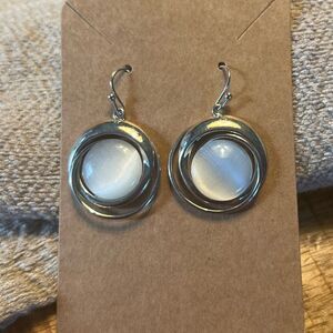 Silver tone plastic moon stone earrings